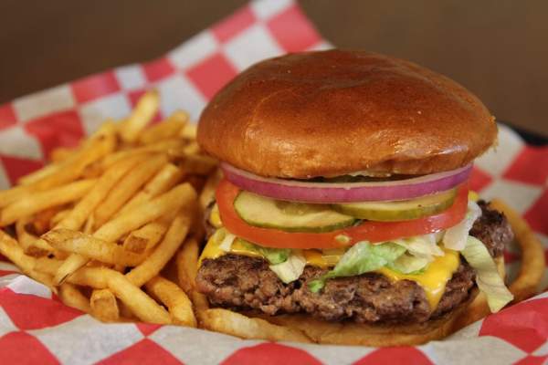 Enjoy a delicious Tavern Burger